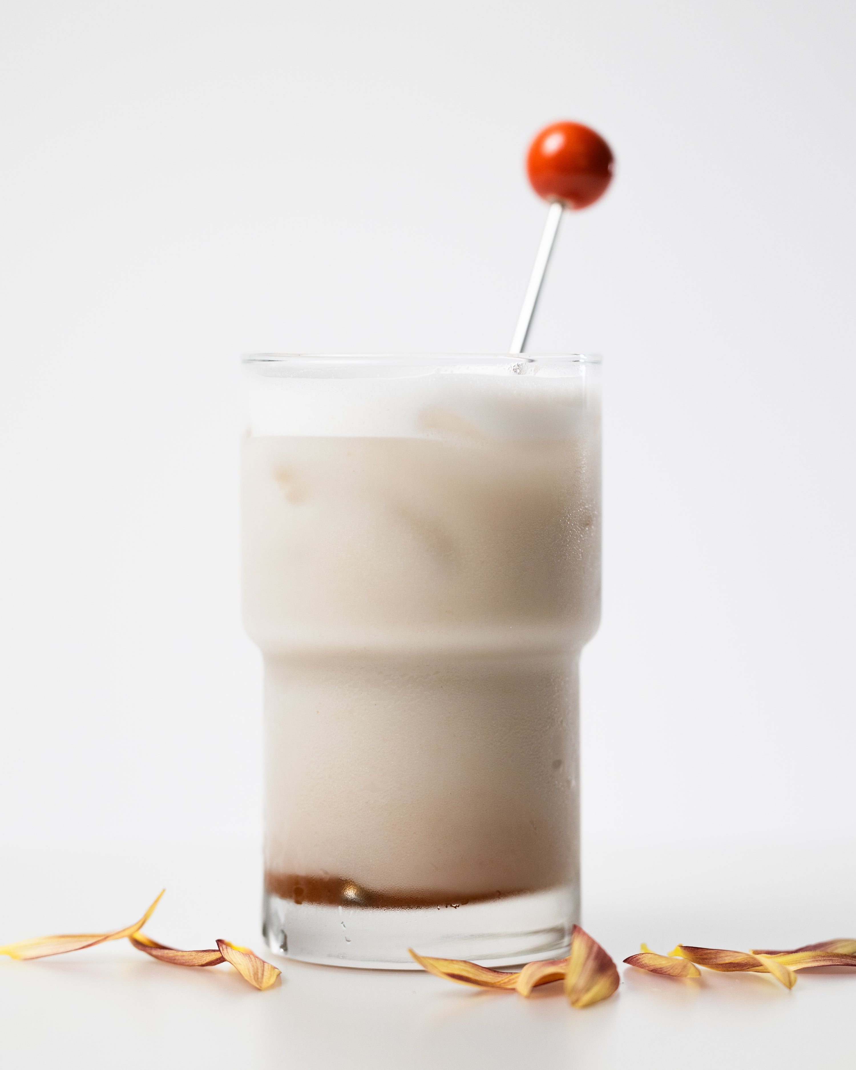 Sparkling water + elderflower syrup + vanilla oat milk