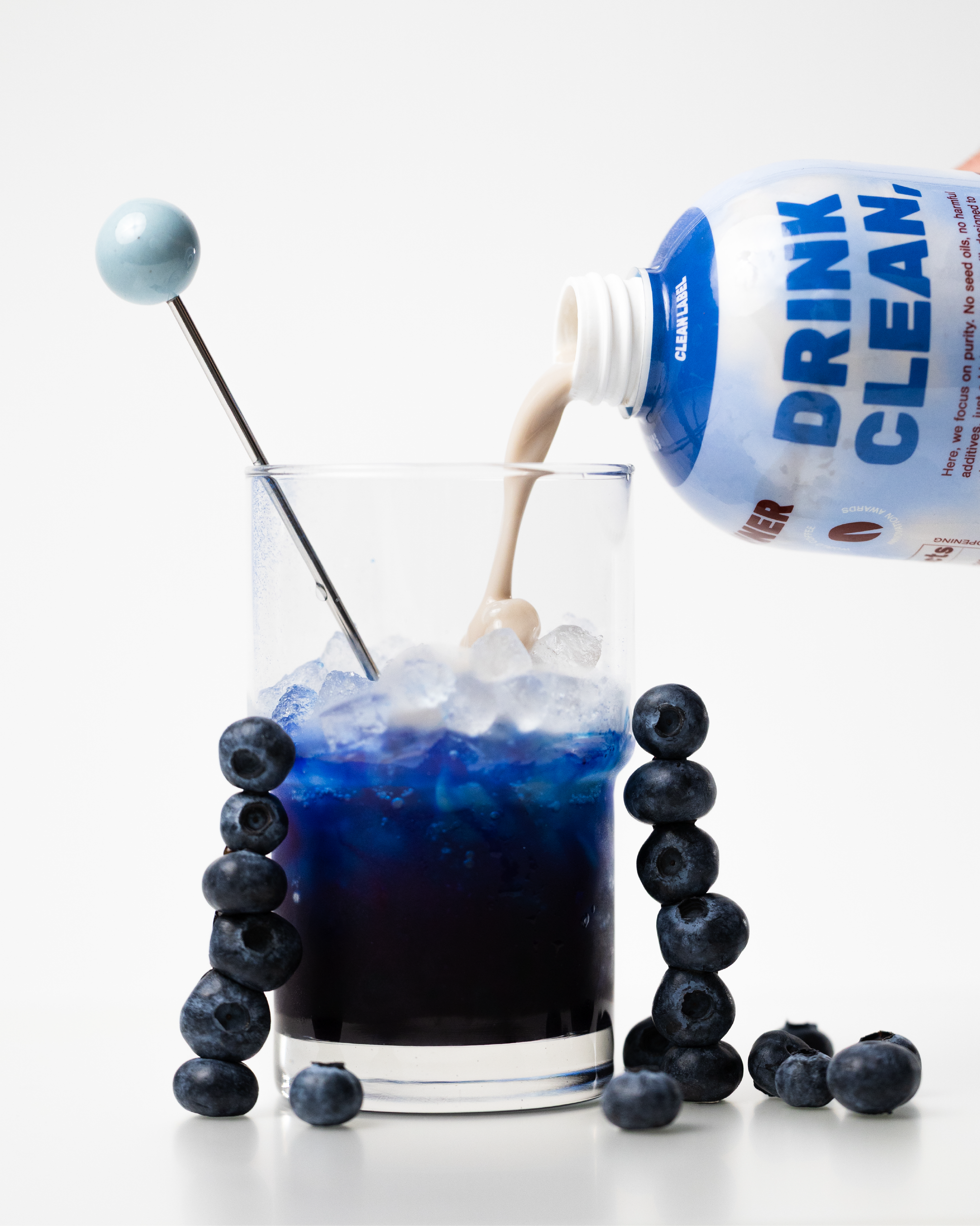 Blueberry syrup + blue spirulina + original oat milk + espresso poured slowly on top 