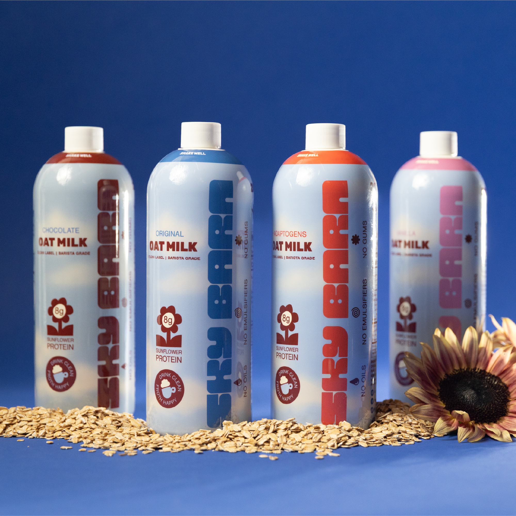 Four flavors of barista grade oat milk, original, vanilla, chocolate, and adaptogen milk