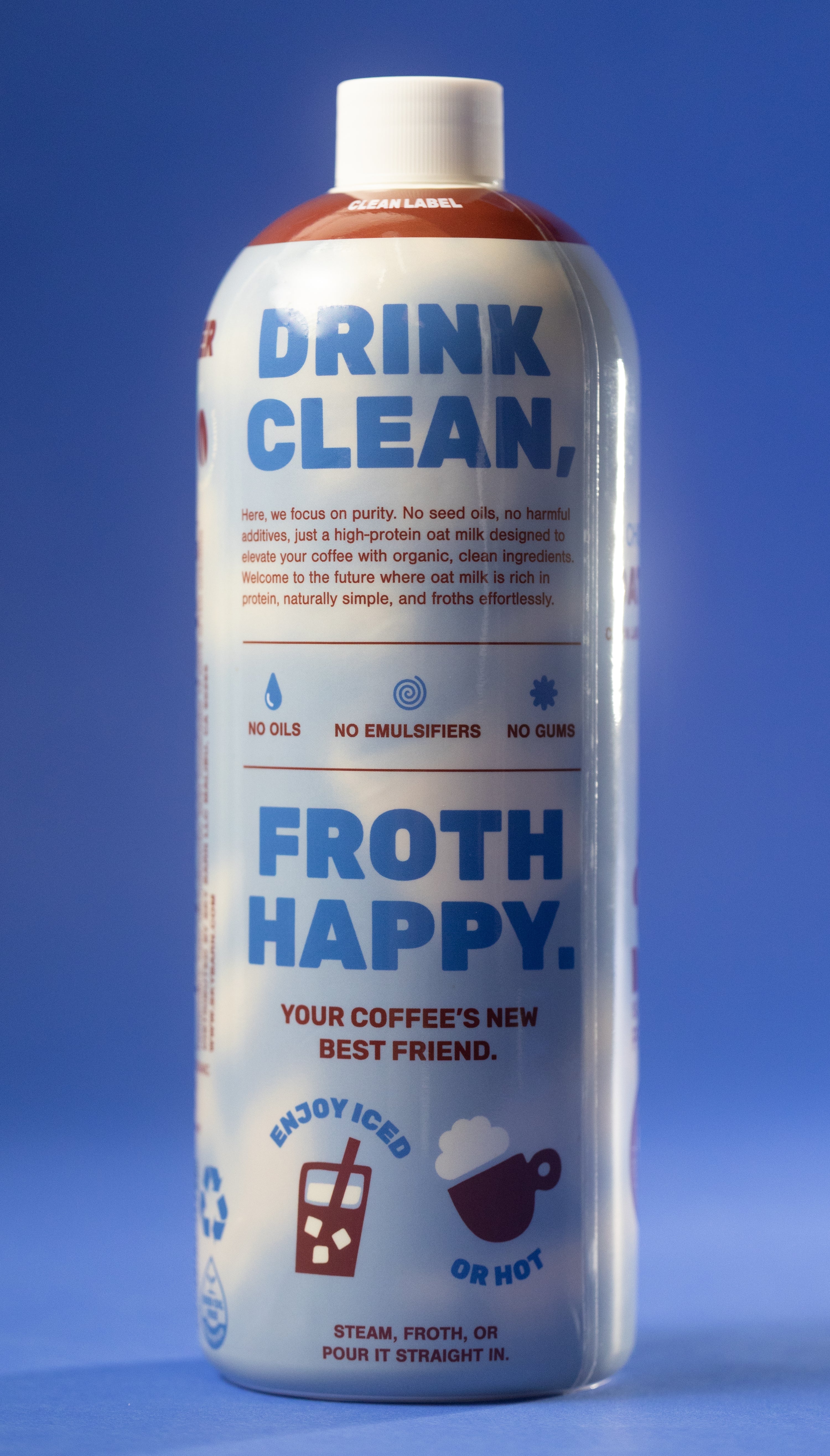 Barista grade bottle of chocolate oat milk with sunflower protein on a cloudy sky background