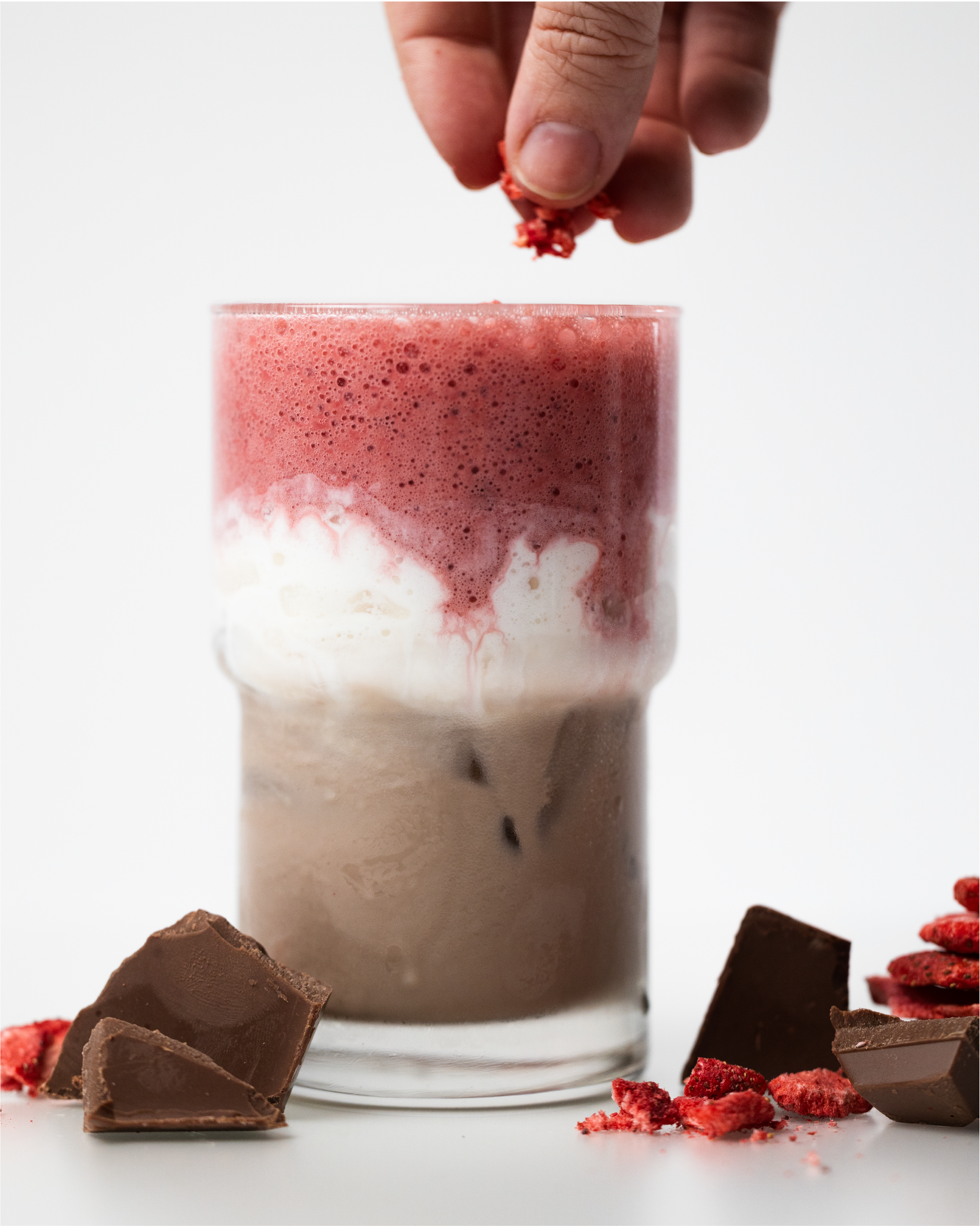 Chocolate oat milk + espresso + top with cold foam + strawberry powder cold foam + freeze dried strawberry garnish